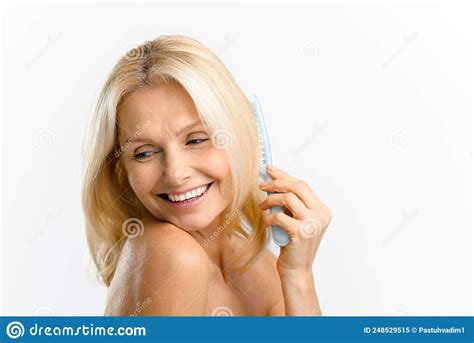 Mature Lady Caring Her Hair Elegant Serene Middle Aged Blonde Woman