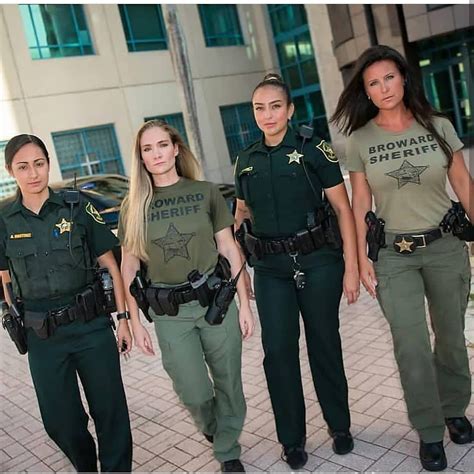 Image May Contain 4 People People Standing Police Women Military