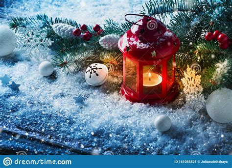 Red Christmas Lantern In Snow With Fir Tree Branch Winter Cozy Scene