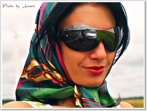 Head Scarf Tied Under The Chin With Mirrored Sunglasses Revealing The Artist Silk Scarf Tying
