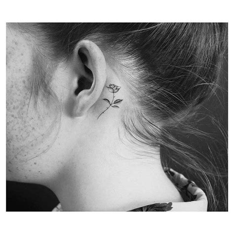 It can suit guys and girls. Single needle rose tattoo behind the left ear.