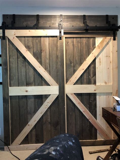 Diy sliding barn door for closet sale, wood barn door somewhere in the world our laundry room a grand statement in your house me what youre still posting im in your pulls locks handle tracks promo sale sliding barn doors wall mounted bracket black hardware sets have a. DIY BYPASS CLOSET BARN DOORS FOR $70 EACH USING TONGUE AND ...