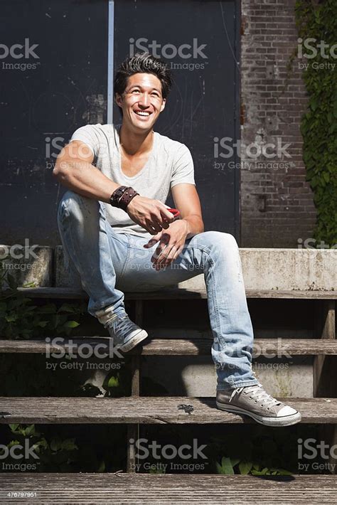 Urban Asian Man Sitting On Stairs Good Looking Cool Guy Stock Photo
