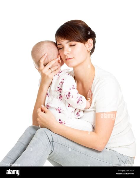 Mother Trying To Comfort Her Crying Baby Isolated Stock Photo Alamy