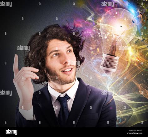Businessman Thinks Of A New Creative Idea Stock Photo Alamy