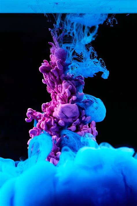 High Speed Photography Of Colorful Ink Diffusion In Water · Free Stock