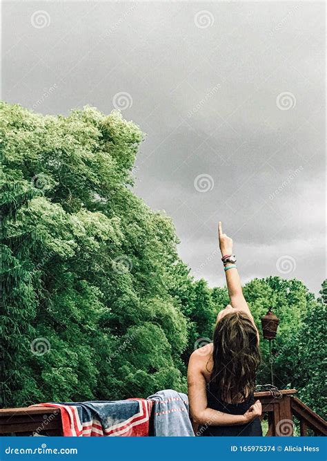 Girl Pointing To A Storm Rolling In Stock Photo Image Of Bracelets