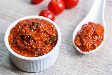 Spicy Tomato Pickle Recipe South Indian Thakkali Thokku By Archanas