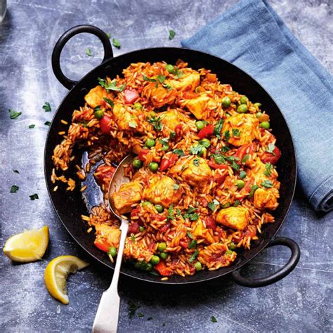 Oven paella with chicken, shrimp, and chorizo. Chicken Paella (4 Portion) - 9 Miles East