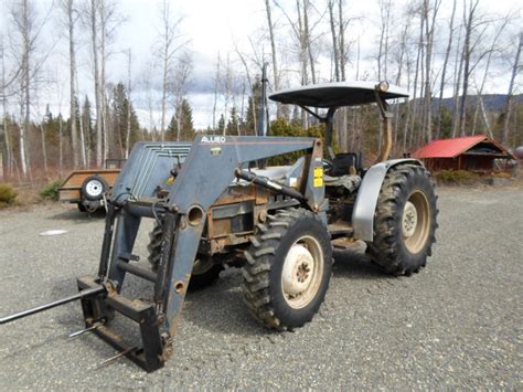 Reduced 1999 Agcowhite 6065 Tractor 4x4 65 Hp Farming Equipment
