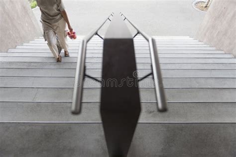 Woman Going Up The Stairs Of The Building Stock Photo Image Of House