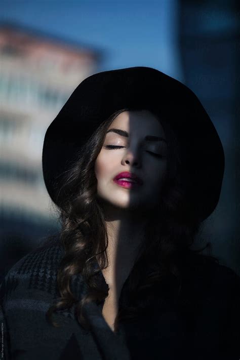Young Beautiful Woman With Curly Hair Hat And Red Lipstick By Maja