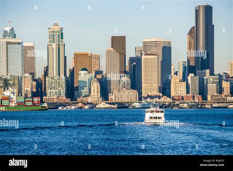 The Seattle Water Taxi And Downtown Seattle Buildings And Waterfront On
