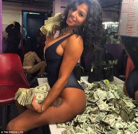 Strippers Pose For Photos With Piles Of Dollar Bills Express Digest