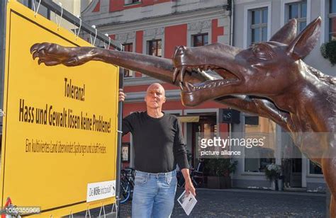 Rainer Opolka Artist And Entrepreneur Stands On The Altmarkt Behind