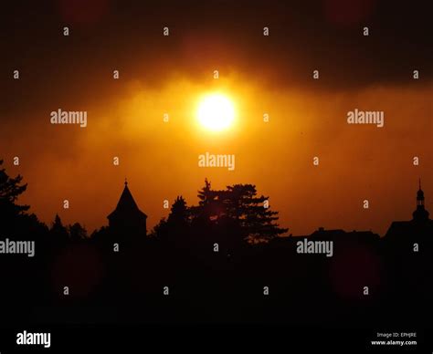 Stormy Sunset Over A Historic Town Stock Photo Alamy
