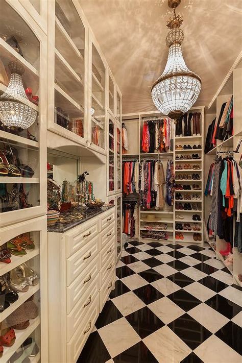 Walk In Closet With Black And White Harlequin Tiled Floor