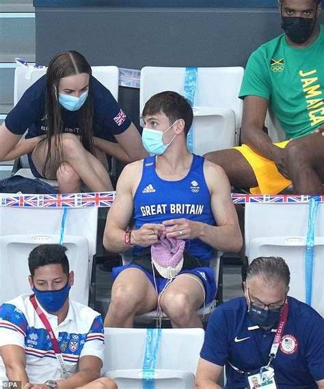 olympic gold medallist tom daley is spotted knitting in the stands tom daley olympic champion