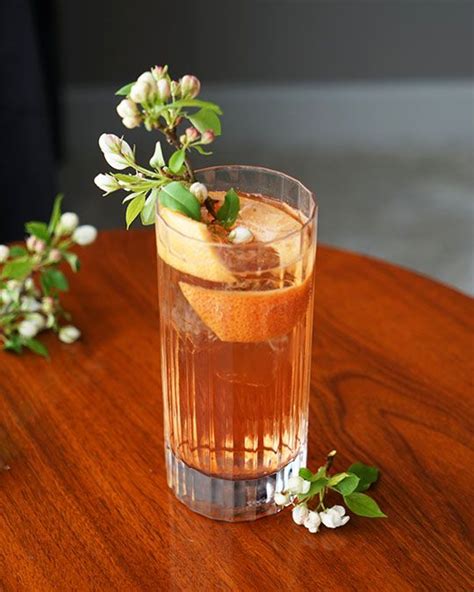 A Japanese Inspired Highball Made With Japanese Whisky Cherry Blossom Liqueur And Fresh