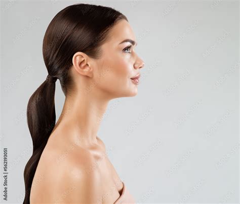 Beauty Model Perfect Face Profile Brunette Woman With Healthy Smooth Facial Skin And Hair Over