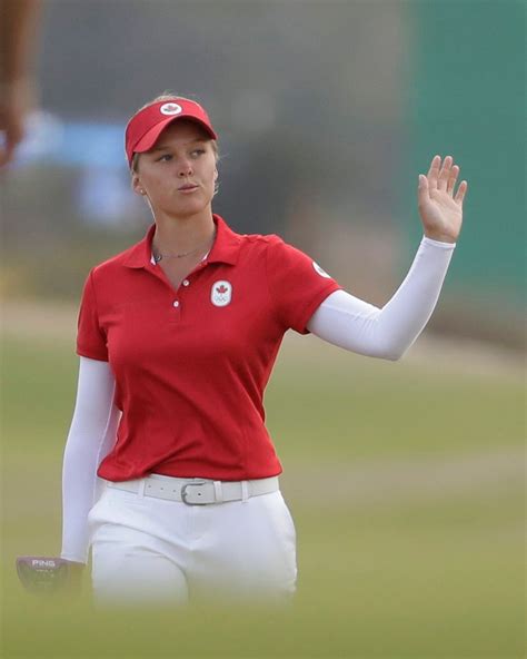 Brooke M Henderson Of Canada Makes Putt On The 18th Hole During The