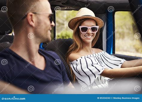 Young Couple Driving Open Top Car On Country Road Stock Image Image Of Vacation Escape 85334243