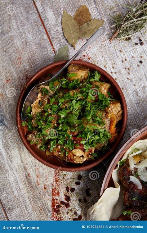 Two Dishes Of Excellent Cuisine With Herbs And Seasonings Stock Photo
