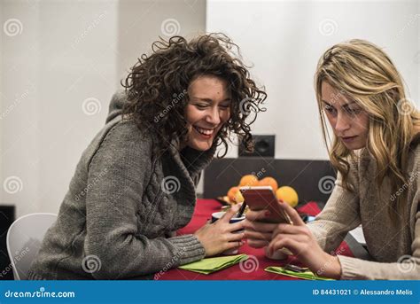 Two Girl Talking At Home In Winter Stock Image Image Of Sweets