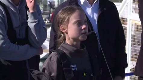 greta thunberg says she is “angry” as she arrives in lisbon ahead of climate conference