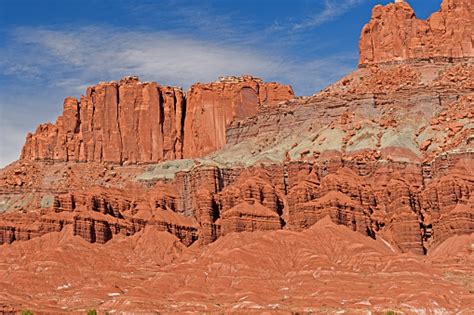 Dramatic Red Rock Cliffs And Formations In The Desert Stock Photo