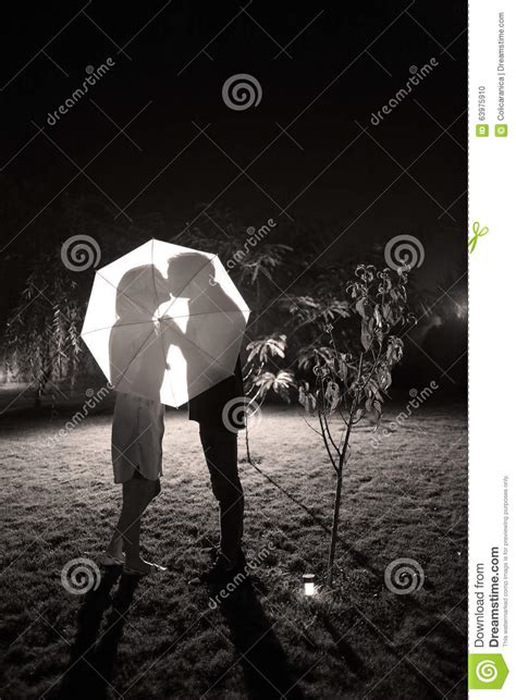 Couple Silhouette Umbrella Kissing