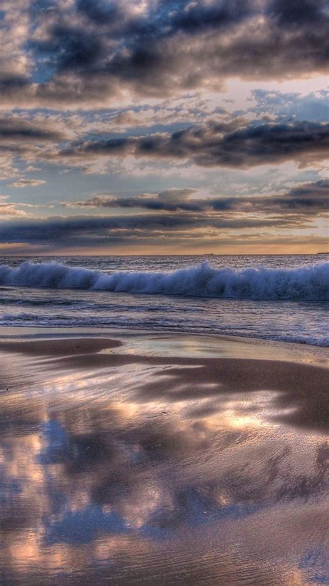 Download Wallpaper 938x1668 Indian Ocean Water Waves Beach Clouds