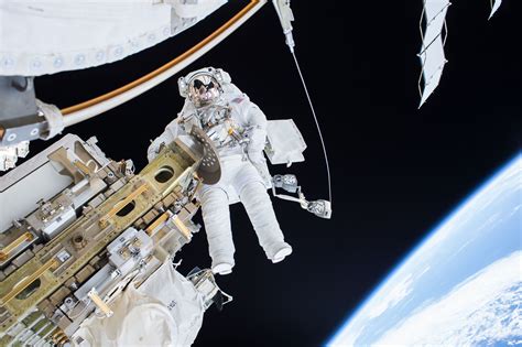 Watch Nasa Astronauts Spacewalk To Install A New Dock For The