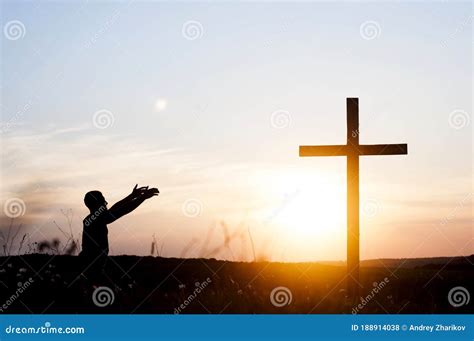 Wooden Cross Against The Sky The Silhouette Of The Cross A Man Is