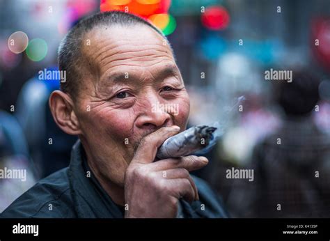 China Man Smoking Hi Res Stock Photography And Images Alamy