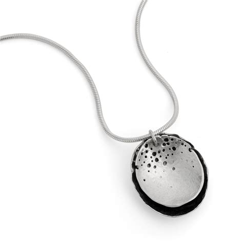 Luxury collection of contemporary amber jewellery from monartti. Double layered silver pendant | Contemporary Necklaces ...