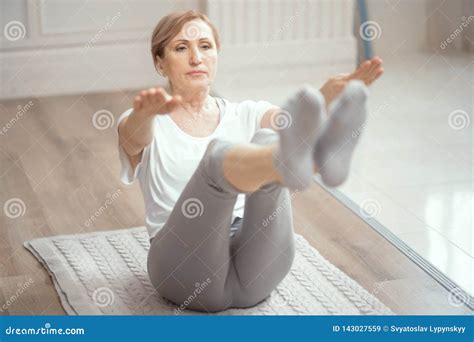 Cheerful Mature Woman Making Yoga Exercises Stock Image Image Of Room Awesome 143027559