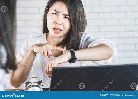 Angry Asian Business Girl Hold A Microphone And Point Royalty Free