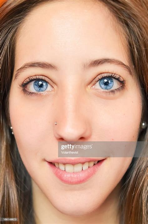 Beautiful Girl Face With Big Blue Eyes Close Up High Res Stock Photo