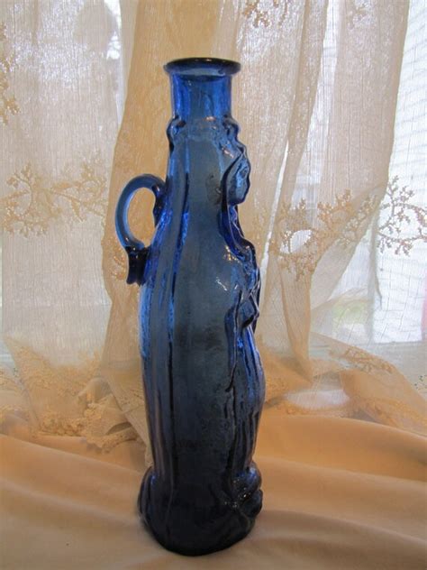 Vintage Blue Glass Virgin Mary Bottle