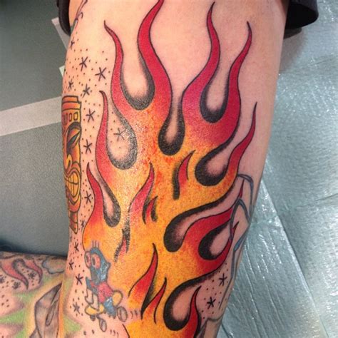 Grey ink fire n flame tattoo on wrist 65 Burny Flame Tattoos
