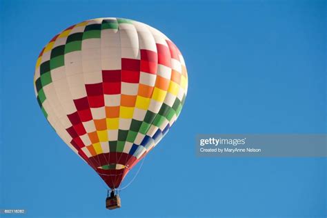 Multicolored Hot Air Balloon Flying High Res Stock Photo Getty Images