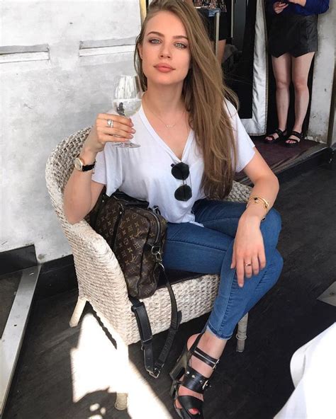 Xenia Tchoumitcheva Jeans A White Tee And A Louis Briefcase Parisian Basics Instagram