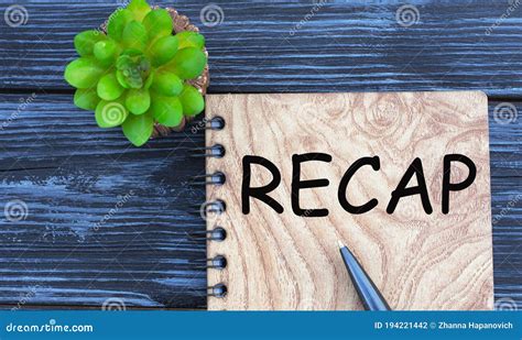 Recap Word On A Beautiful Dark Background With Cactus Stock Photo