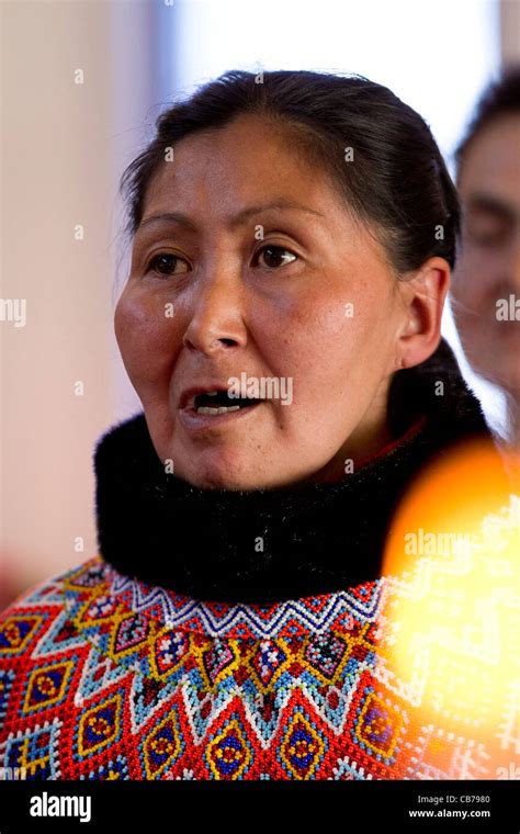 Inuit Woman In Traditional Dress Sings In Church Choir Kangaamiut