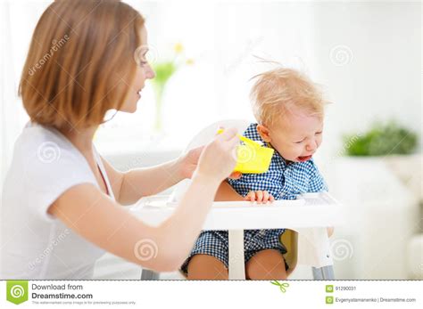 Mother Feeds The Cry Baby Son Stock Image Image Of Capricious