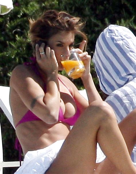 Elisabetta Canalis Exposing Sexy Body And Boobs On Pool Porn Pictures
