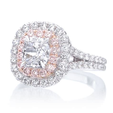 The perfect pink is set in a ring made of 18kt rose and white gold, with smaller, colorless emerald cut side diamonds to enhance the pink diamond's. 18K White Gold Double White & Pink Diamond Halo Engagement ...