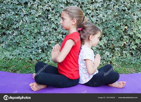 Little Girl Doing Yoga Exercise ⬇ Stock Photo Image By © Leetorrens