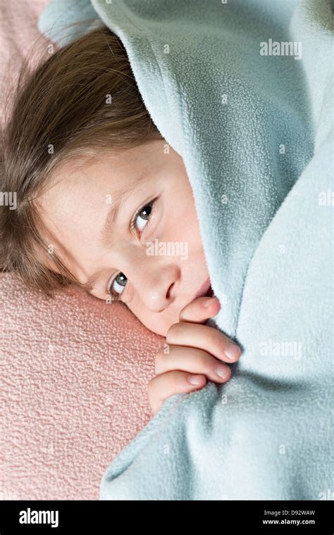 Child Under Blanket Hi Res Stock Photography And Images Alamy